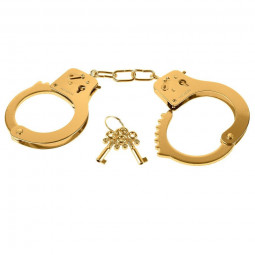Bdsm handschellen aus goldfarbenem metall aus einer fetischserie
BDSM Handschellen
